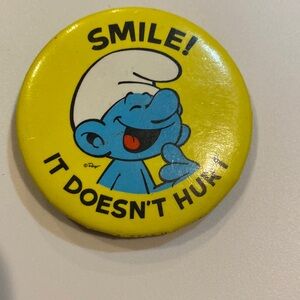 Vintage Smurf old stock button.